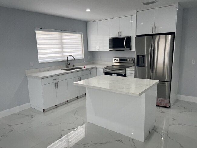 Building Photo - "Charming 2-Bed Retreat Waterfront W/Pool ...