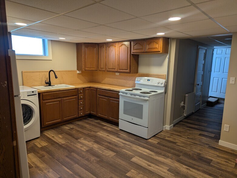 Kitchen, new birchwood counters, nice natural light. - 906 Bethel St