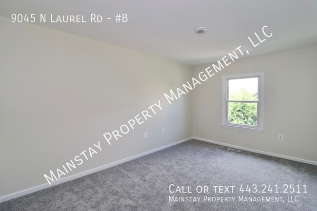 Building Photo - 9045 N Laurel Rd