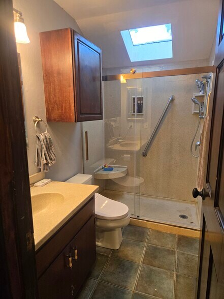 Bathroom with glass shower door - 132 Steiner Ct