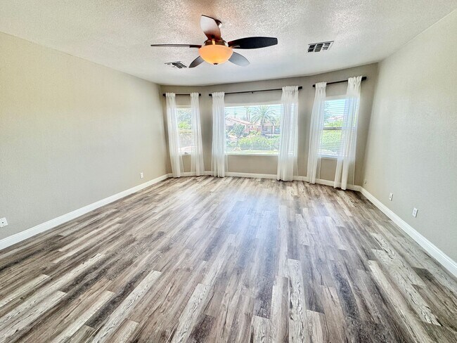 Building Photo - Pristine Single Level 3 Bedroom Home In The Sought After Gated Lagos Vistoso Community in Chandler!