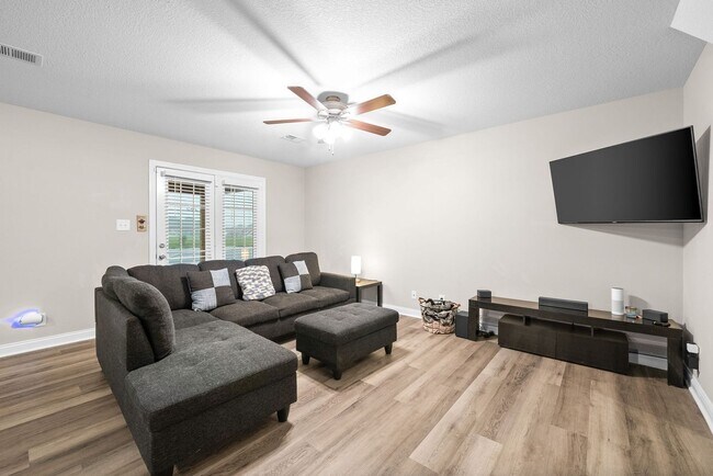 Building Photo - Stocked Pond, Walking Trails and More!!