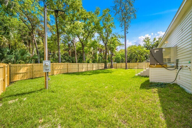 Building Photo - Experience exceptional living at its finest