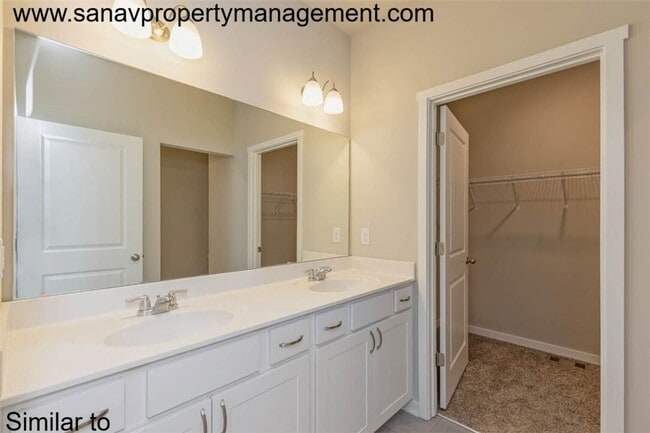 Building Photo - "Charming 2-Bedroom Home in Exclusive 36 W...