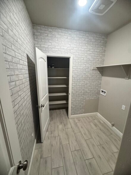 Walk in Laundry room with a large linen closet - 11281 E Belmont Ave