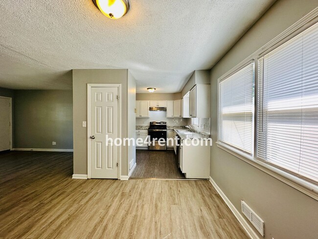 Building Photo - Ranch Style Home in KCMO w/ LVP Floors, SS Appliances and a Fenced Yard!