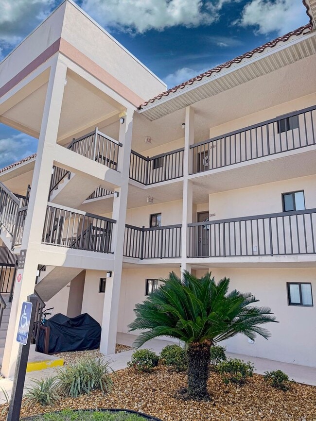 Building Photo - Beautifully Renovated, Fully Furnished Beach Condo just a short walk from the ocean.