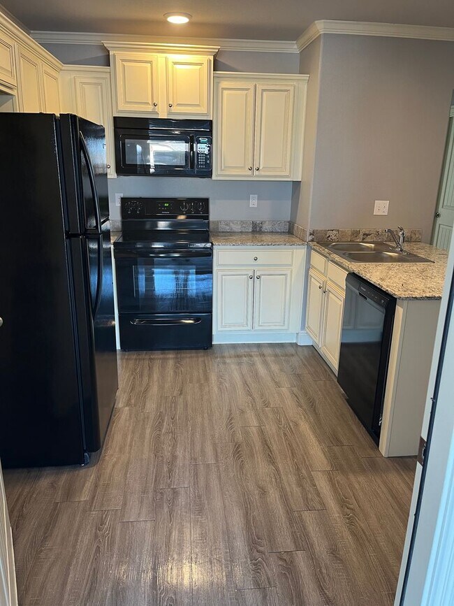 Building Photo - **Call Heather at 479-208-0305 to discuss ...