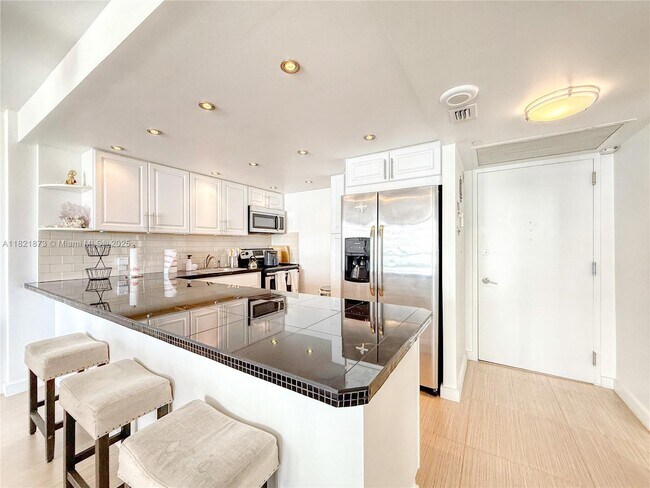 Building Photo - 5701 Collins Ave