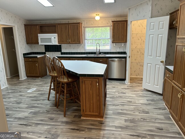 Building Photo - 6598 Jackson Trail Rd