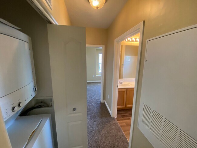 Building Photo - All NEW flooring in this spacious 3-bedroo...