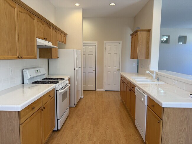 Building Photo - South Reno Home with 4 Bedrooms + 3 Car Garage!