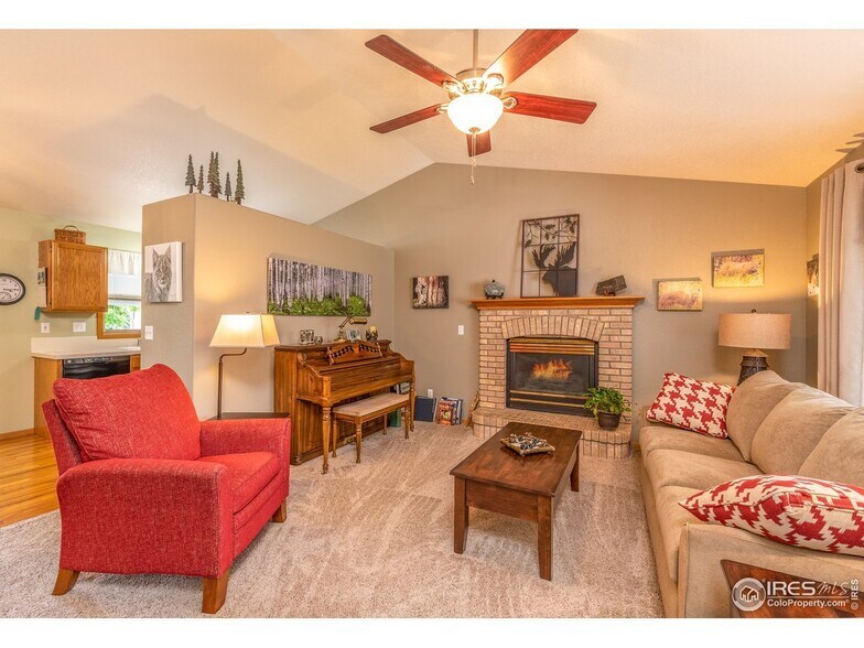 living with gas fireplace - 2338 Moorgate Dr