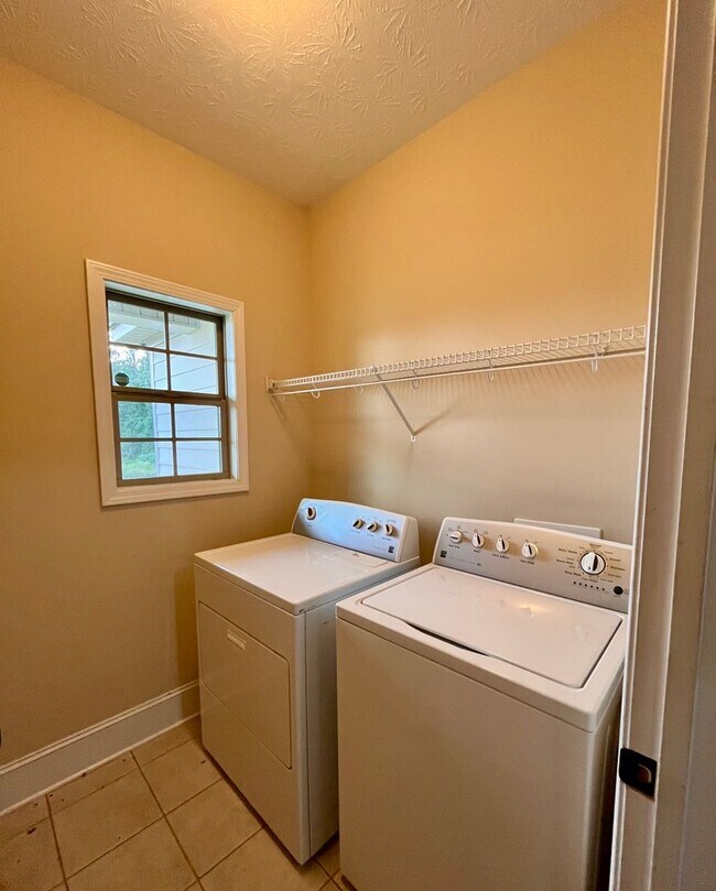 Building Photo - Spacious 3-Bedroom Home with Garage, Large...