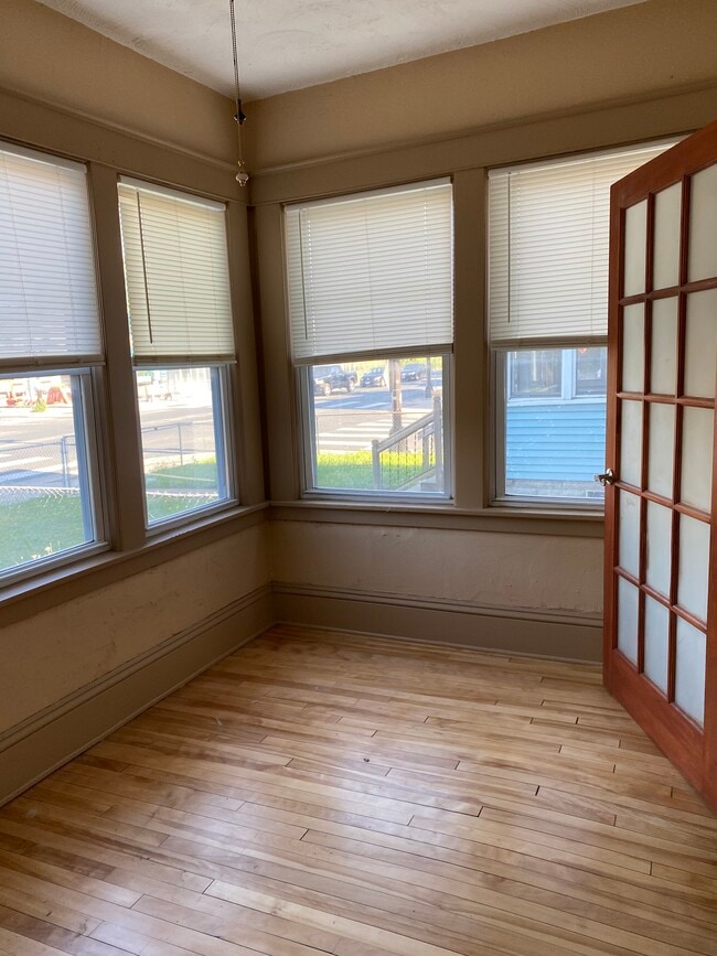 A French door leads to the sunroom/office from the living room - 3452 Nicollet Ave