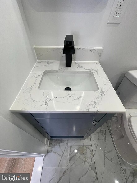 top floor bathroom sink - 2321 W Oxford St