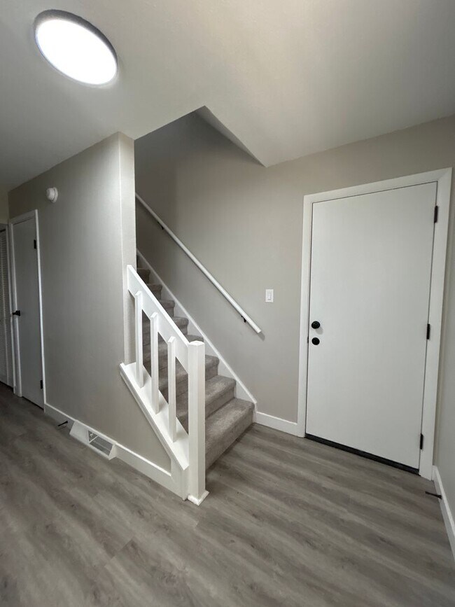 Building Photo - Beautifully Redone 3-Bedroom, 1.5-Bathroom Condo with Attached Garage – $1,725/Month (Lawn Care &...