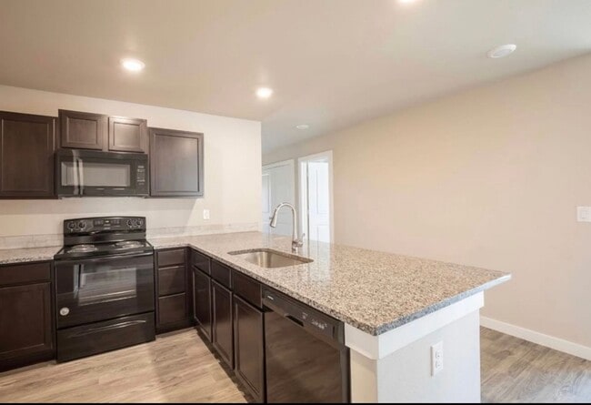 Building Photo - Exclusive Bell Farms Townhomes