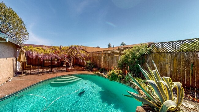 Building Photo - PURE Property Management - Stunning four-b...