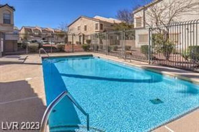 Building Photo - Lovely 4 bedroom 2.5 bath townhome in North Las Vegas gated community with a pool!
