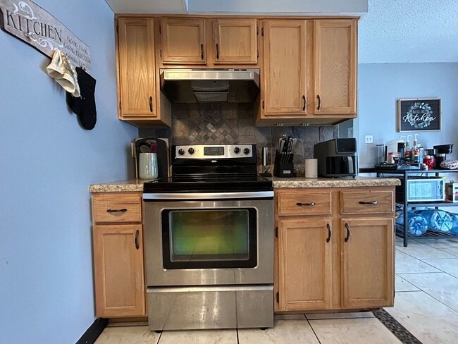 Building Photo - Introducing this fantastic townhome in the...