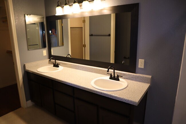 Building Photo - Home With A Pool and Much More!