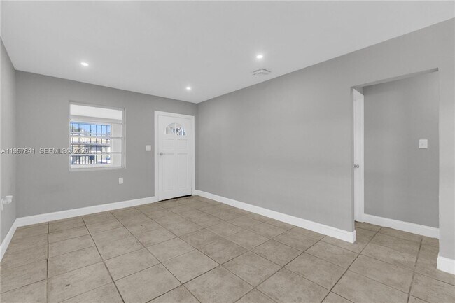 Building Photo - 6940 NW 6th Ct