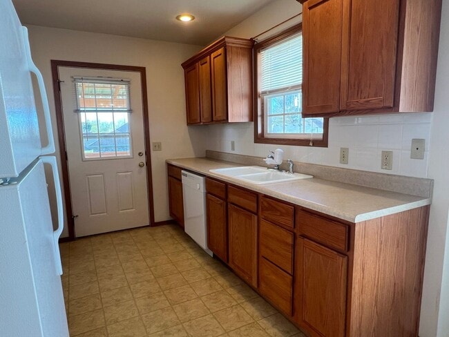 Building Photo - COMING SOON! All-Brick Duplex near Nixa High School