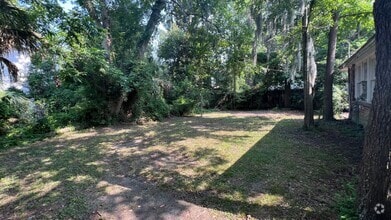Building Photo - Four Bedroom - Two Bathroom - Single Famil...