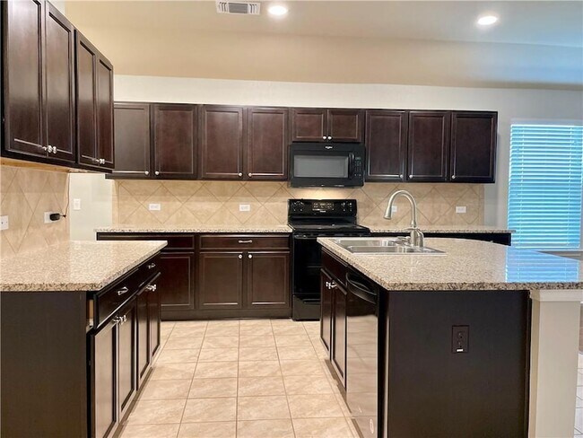 Building Photo - 115 Leona River Trl