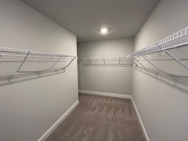 Building Photo - Newly Built 4BD, 3BA Cary Townhome with Modern Amenities and Screened-In Patio