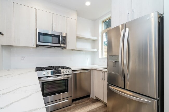 Building Photo - Stylish 3 Bedroom with Rooftop Decks and Dedicated Parking