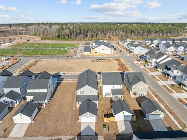Building Photo - This brand-new home makes a statement from the moment you arrive!