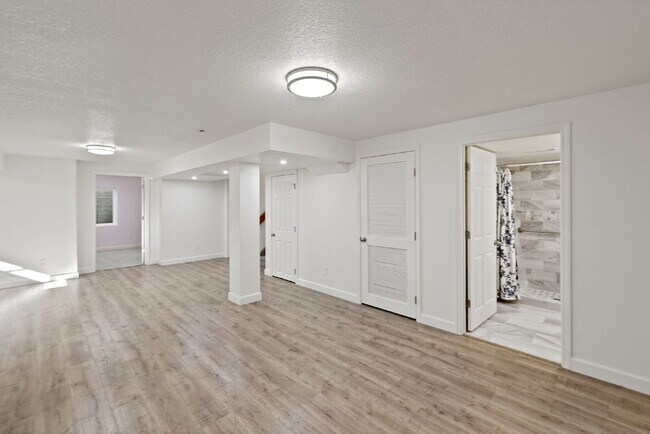 Building Photo - Spacious 6-Bedroom / 3.5-Bath Home — Great Location + Solar Savings!