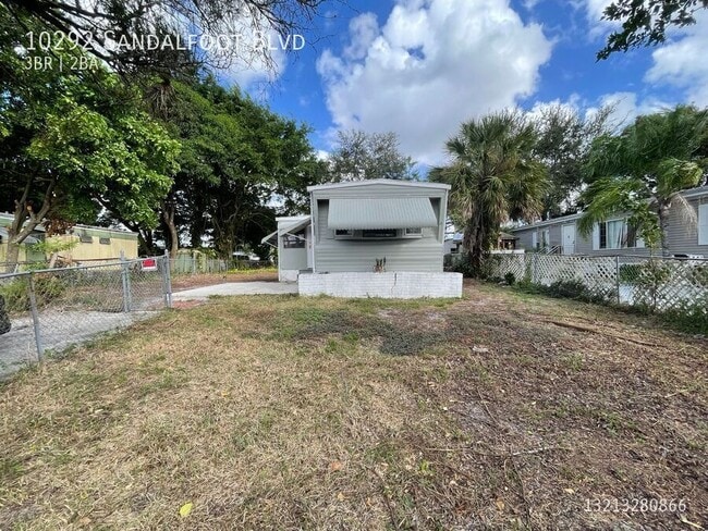 Building Photo - 10292 SW Sandalfoot Blvd