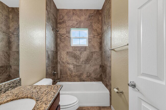 Building Photo - "Charming 2-Bed, 2-Bath with Granite Finis...