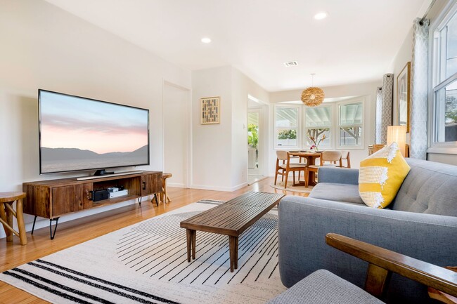 Building Photo - South of Conant 3 Bedroom, 1 Bath Home on over 5000 Square Feet, an entertainers dream!