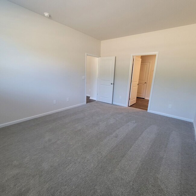 Building Photo - Brand New 4 bedroom, 2 bathroom house located in the desirable Brunswick Forest community in Leland