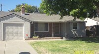 Building Photo - Three bedroom 1 bath with central heat and...