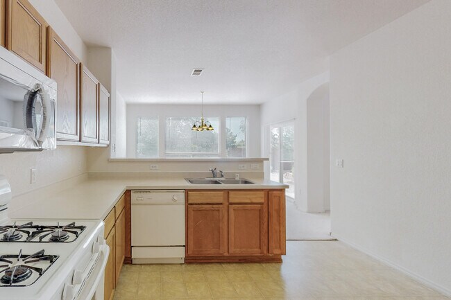 Building Photo - 6568 Los Pueblos Pl NW