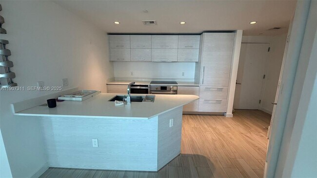 Building Photo - 1300 S Miami Ave