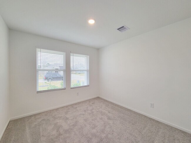 Building Photo - This lovely single-level home showcases a spacious open floorplan shared between the kitchen, din...