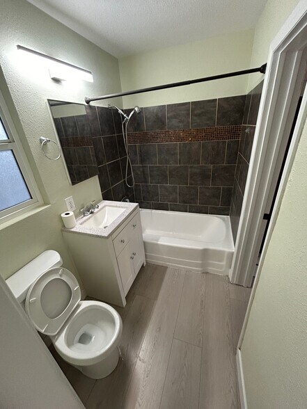New floors, new toilet, new vanity! - 5398 34th St