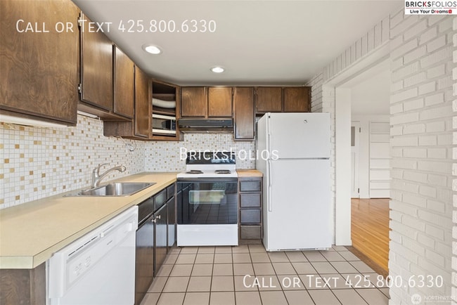 Building Photo - Charming Tudor Retreat: Your Perfect Home ...