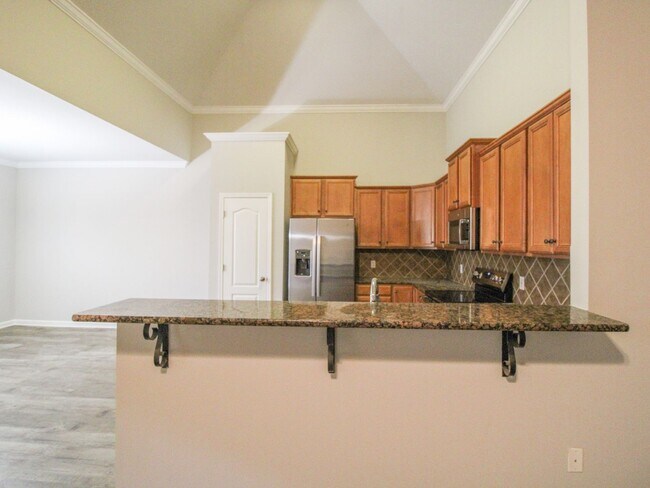 Building Photo - Gorgeous Corner-Lot Home in Canebrake Club – Lawn Care Included