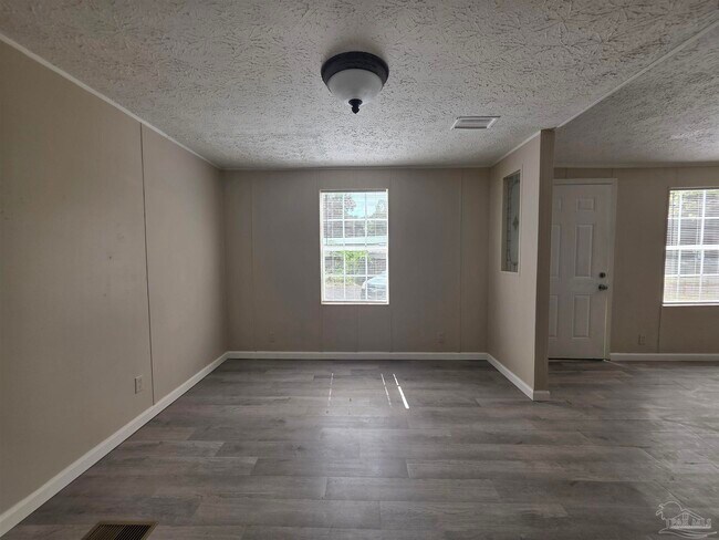 Building Photo - 8906 Figland Ave