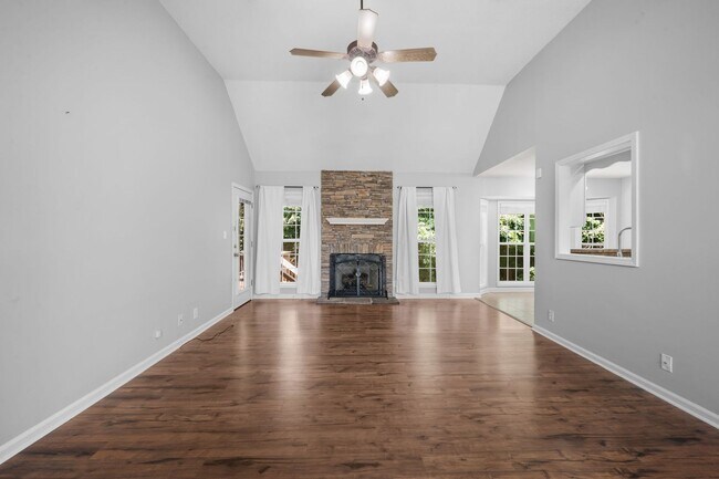 Building Photo - Stunning Stone Fireplace • Finished Basement • Fenced Yard