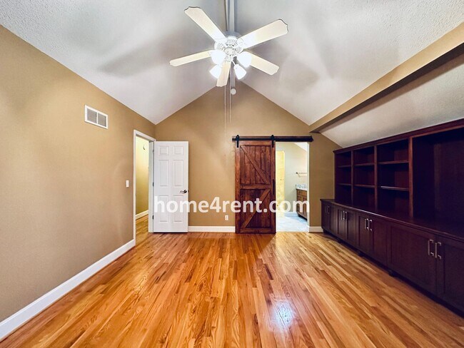 Building Photo - A Lovely, Four Bedroom Lenexa Home w/ Wood...