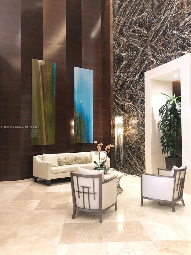 Building Photo - 15811 Collins Ave