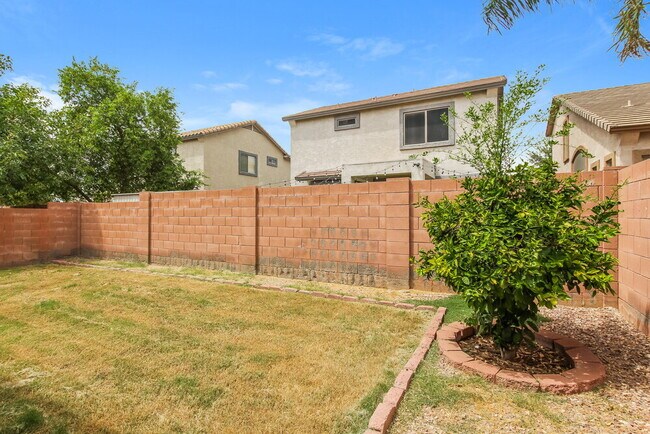 Building Photo - 9822 E Empress Ave